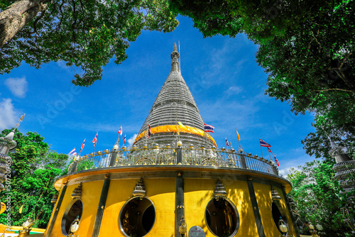 Background of religious sights on high mountains in Hat Yai District of Thailand (Phra Maha Ruesee Chedi Tripob Trimongkol) is a beautiful stainless steel pagoda, tourists always come to make merit du