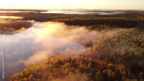 Eeyou Istchee Baie-James river at sunrise with fog photo
