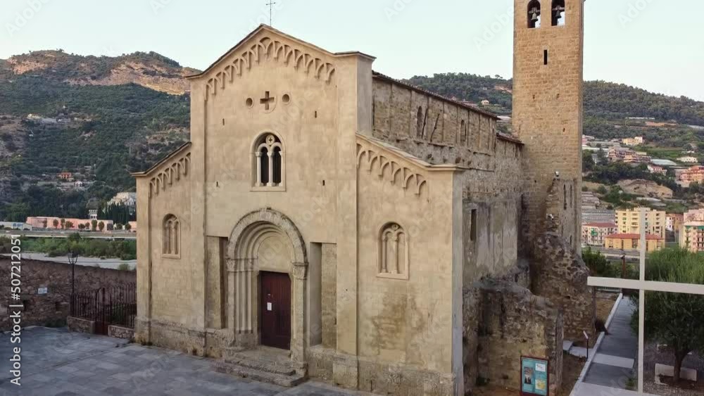 Aerial drone shot of a view of the church of San Michele Arcangelo in the medieval old town of Ventimiglia in Italy, Liguria, Italy. Beautiful panoramic aerial view from flying unmanned aerial vehicle Aerial drone shot of a view of the church of San Michele Arcangelo in the medieval old town of Ventimiglia in Italy, Liguria, Italy. Beautiful panoramic aerial view from flying unmanned aerial vehicle