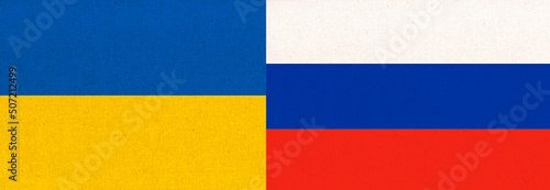 Flag of the two countries. Ukrainian and Russian two folded flags