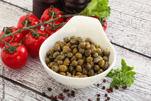 Marinated green capers in the bowl