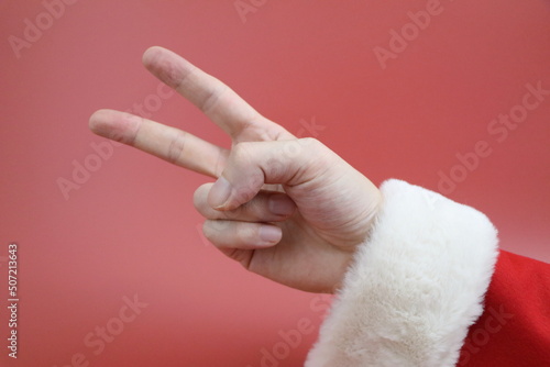 サンタクロースの手のポーズ（クリスマスのイメージ素材）