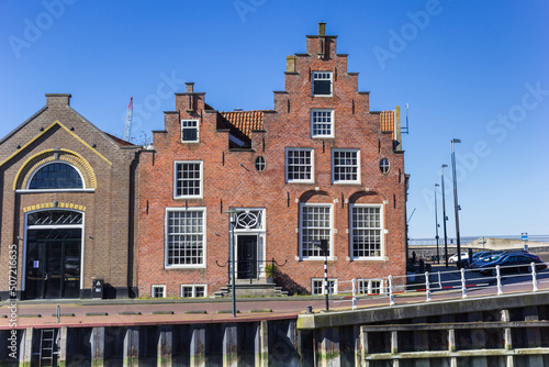 Historic house with step gable in Harlingen, Netherlands photo