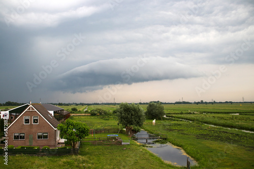 Dark clouds above the polder Krimpenerwaard just before heavy rainfall and thunderstorm