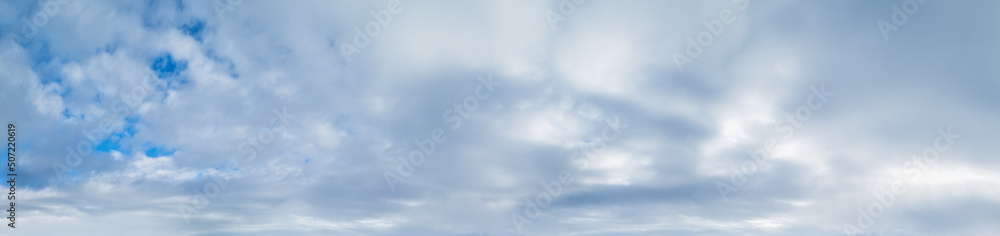 White clouds in blue summer sky panoramic background White clouds in blue summer sky panoramic background
