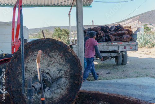 handcrafted agave grinding mill in oaxaca photo