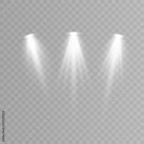Set of spotlights isolated on transparent background. Vector glowing light effect with golden rays.