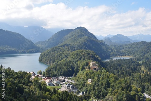 Panoramic view from Neuschwanstein castle at southern Bavaria. Forest, hills and lakes and the Hohenschwangau Castle at the horizon. Bavaria, Germany, September 2021 © ILIAS