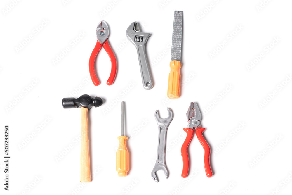 Plastic toy tools isolated on a white background. Plastic toy tools isolated on a white background.