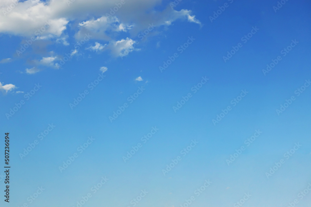 Blue sky background and white clouds soft focus, and copy space horizontal shape. Blue sky background and white clouds soft focus, and copy space horizontal shape.