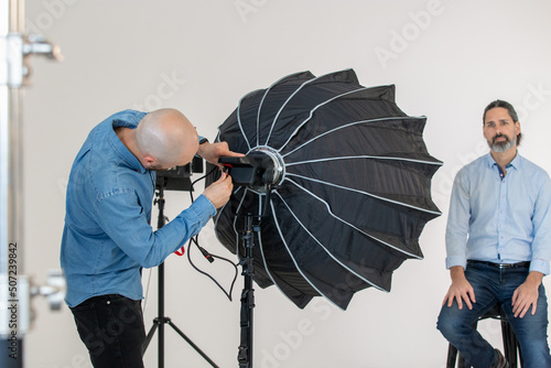 Obraz na płótnie Setting Up Soft Box Lighting on Video Production Set
