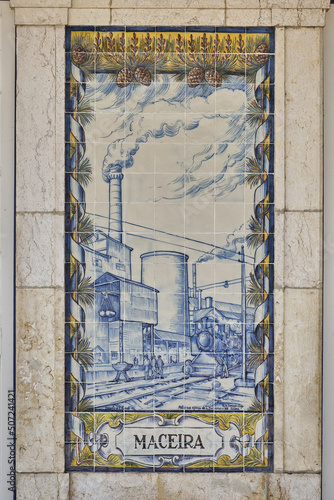 azulejos panel representing monuments and country scenes on the walls of Leiria station, Portugal