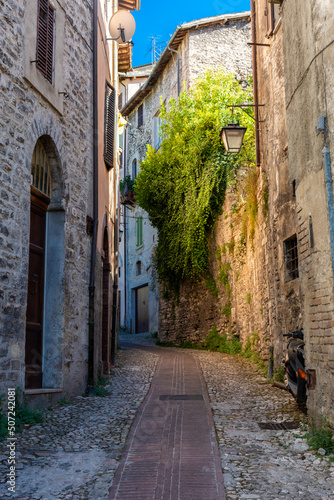 Medieval street in the historic center of Spoleto  town in Umbria Italy
