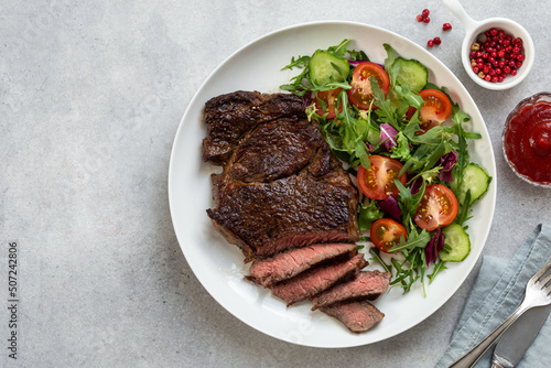 beef steak with fresh vegetable salad