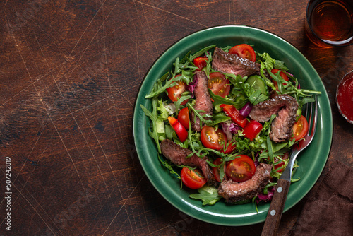 beef steak and  vegetable salad photo