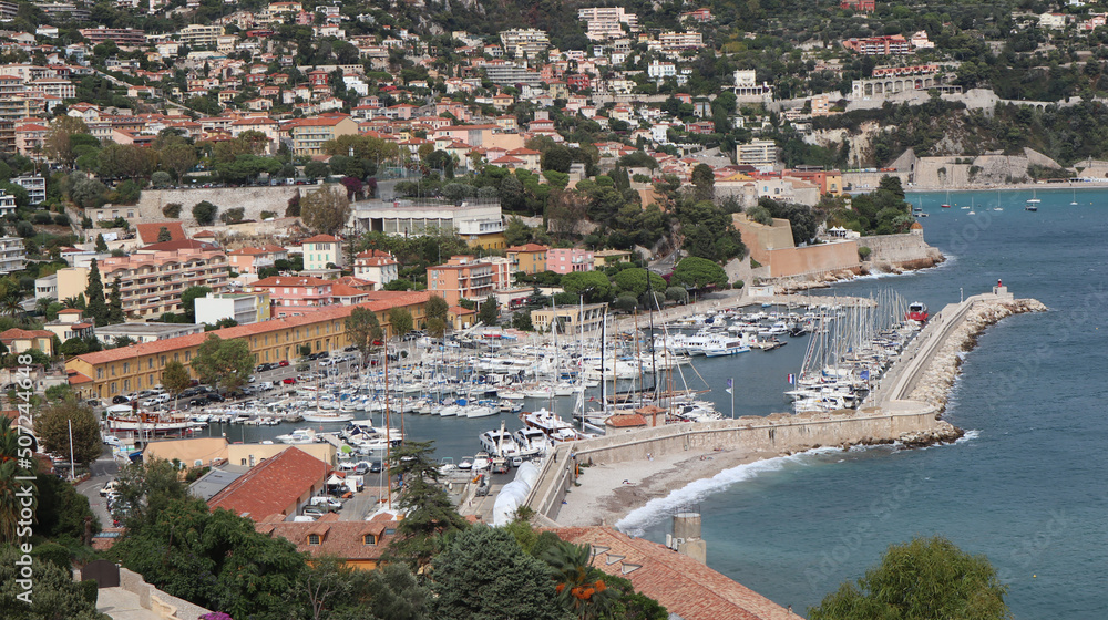 Fototapeta premium Picturesque beautiful small town on the mediterranean sea. French riviera coast near Monaco. Old port from aerial view