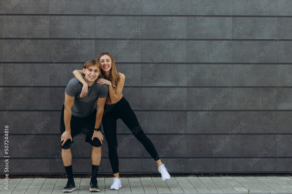Portrait of a sport couple. hugging and smiling. Copy space Portrait of a sport couple. hugging and smiling. Copy space