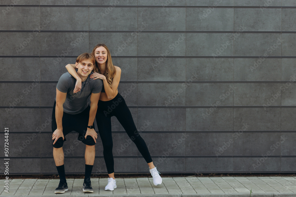 Portrait of a sport couple. hugging and smiling. Copy space Portrait of a sport couple. hugging and smiling. Copy space