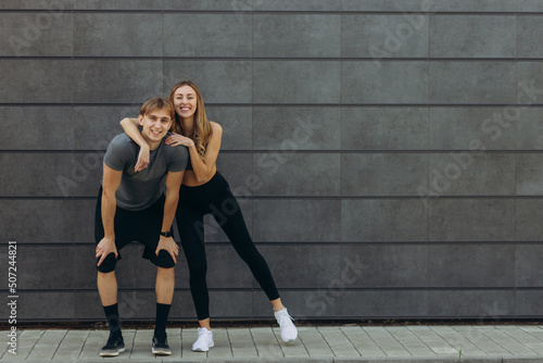 Portrait of a sport couple. hugging and smiling. Copy space