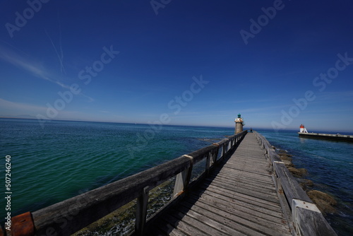 lighthouse sea and jetty