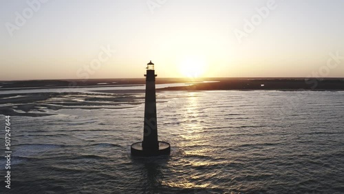 Aerial Shot of Morris Island SC Lighthouse Folly Beach at Sunset