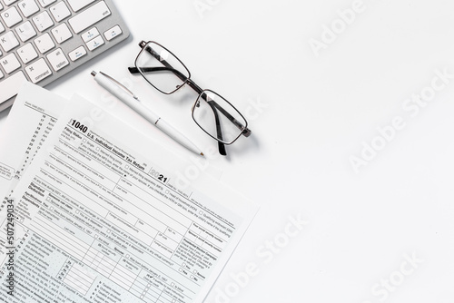 US tax form on businessman office table desktop  top view