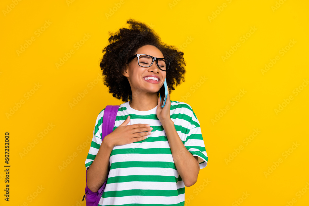Photo of cute millennial brunette lady wear eyewear t-shirt isolated on yellow background