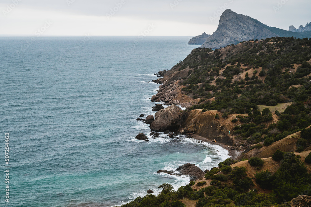 Sea waves on the rocky coast