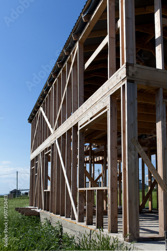 Construction of a wooden frame house