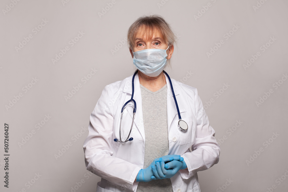 Female doctor standing ready to work. Healthcare and medicine concept Female doctor standing ready to work. Healthcare and medicine concept