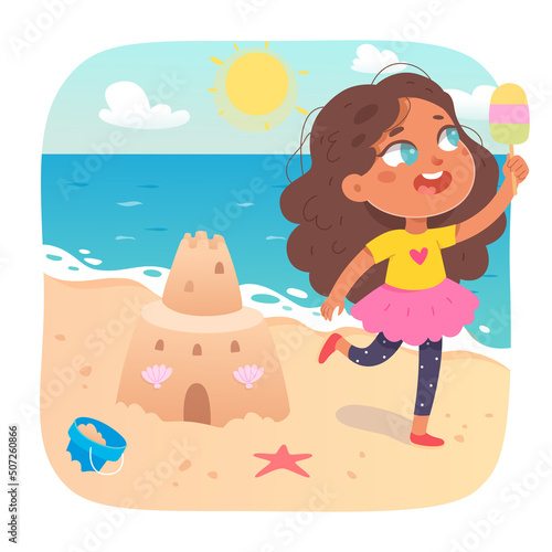 Happy kid eating ice cream on sea beach with funny sand castle, girl holding sorbet