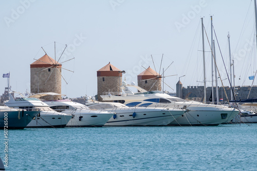 The medieval windmills in Mandraki harbour in Rhodes, Greece