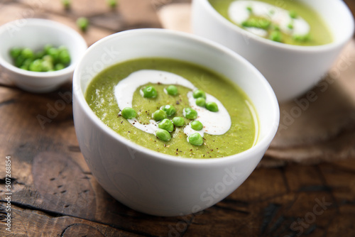 Homemade green pea soup with cream