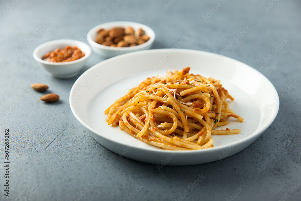 Pasta with red pesto and cheese