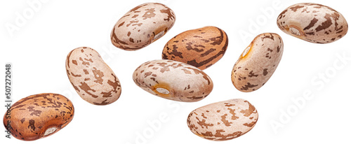 Falling pinto beans isolated on white background photo