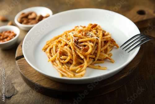 Pasta with red pesto and cheese