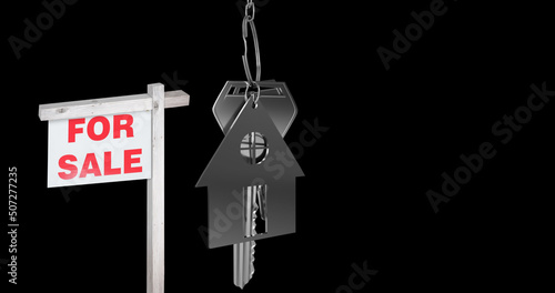 Image of house for sale sign and house keys on black background