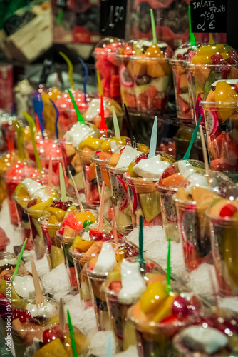 a traditional display of chopped fresh fruit sold in Barcelona's famous bouquerie photo
