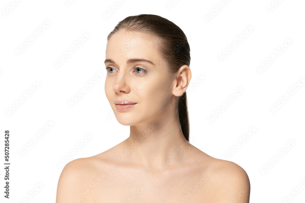 Portrait of young tender girl with perfect clear skin looking away, posing isolated over white studio background Portrait of young tender girl with perfect clear skin looking away, posing isolated over white studio background