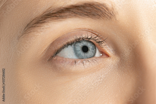Fototapeta Naklejka Na Ścianę i Meble -  Close-up image of beautiful blue female eye. Laser vision correction. Concept of health, medicine, surgery
