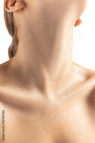 Close-up image of slim beautiful female neck and collarbones. Taking care after skin and body condition
