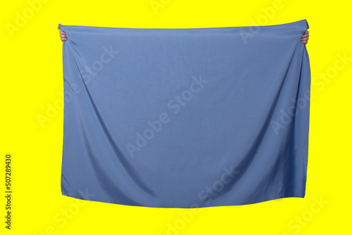 .blue fabric with a place for writing on a yellow background