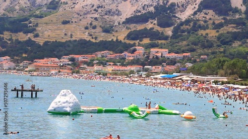 Tourists in Bashka, island Krk, Croatia. Europe.