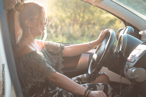Wallpaper Mural beautiful young adult woman driving a car in summer day Torontodigital.ca