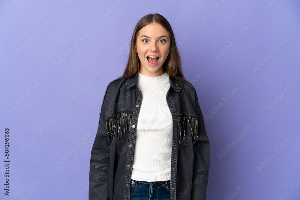 Young Lithuanian woman isolated on purple background with surprise facial expression Young Lithuanian woman isolated on purple background with surprise facial expression