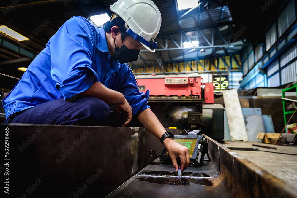 UT, Ultrasonic testing to detect imperfection or defect in welding of steel structure outside. NDT Inspection. UT, Ultrasonic testing to detect imperfection or defect in welding of steel structure outside. NDT Inspection.