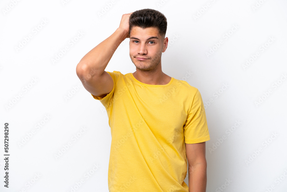 Young caucasian man isolated on white background with an expression of frustration and not understanding Young caucasian man isolated on white background with an expression of frustration and not understanding