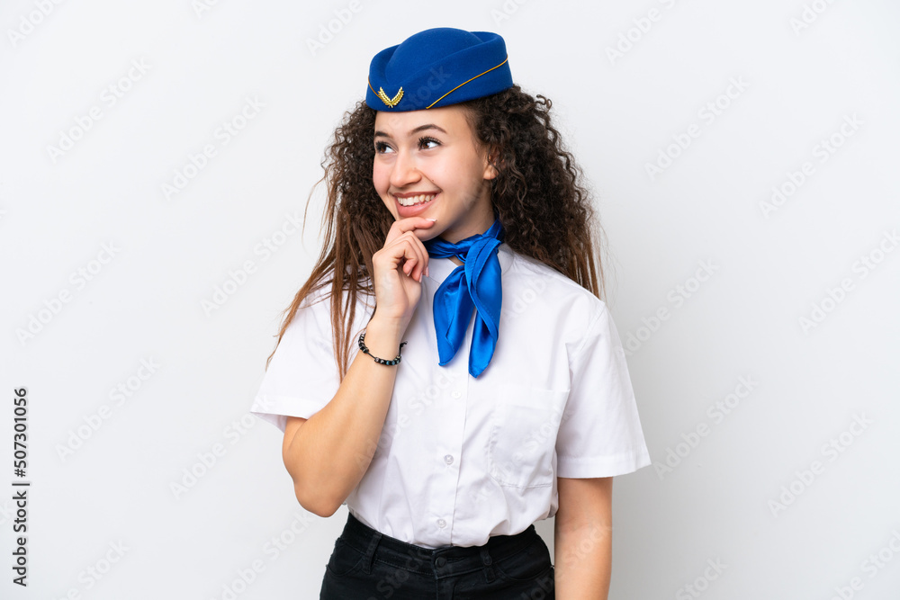 Airplane stewardess Arab woman isolated on white background looking to the side Airplane stewardess Arab woman isolated on white background looking to the side