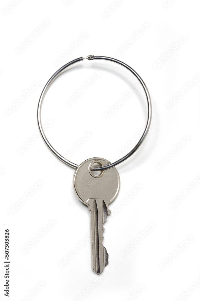 Single Key with Keychain Ring, Opaque Silver - Top View, Macro Close Up - Isolated on White Background Single Key with Keychain Ring, Opaque Silver - Top View, Macro Close Up - Isolated on White Background
