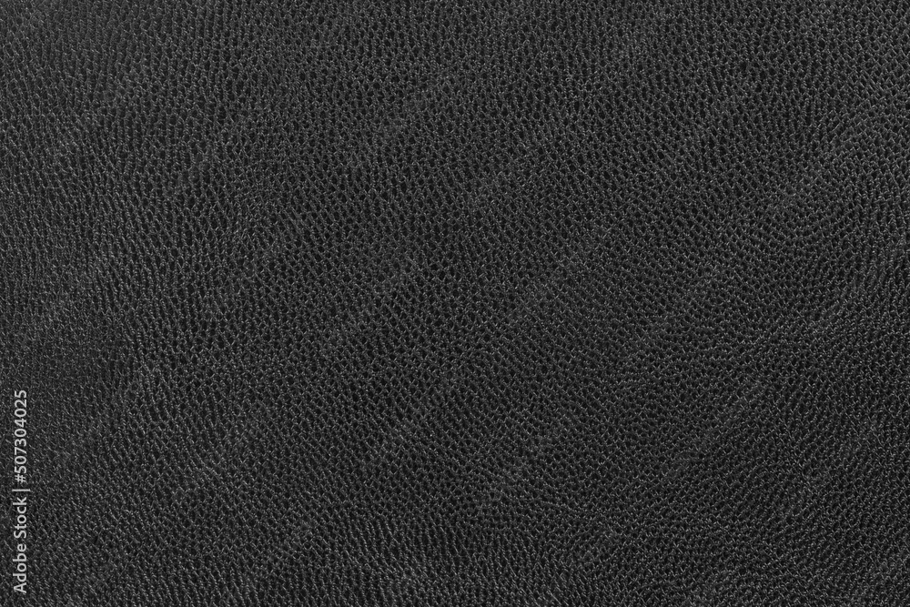 Black leather background texture for designers.black skin. black background texture with pattern. Textured surface of dark skin product Black leather background texture for designers.black skin. black background texture with pattern. Textured surface of dark skin product
